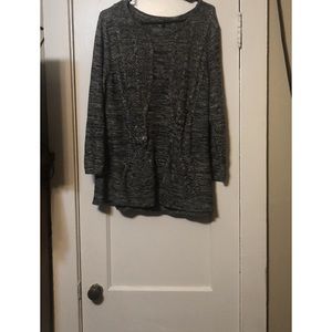 This is a gray and white sweater that I did not wear that much.